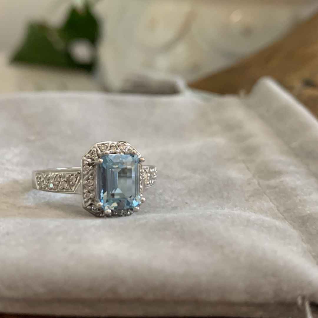 Aquamarine and diamond engagement ring