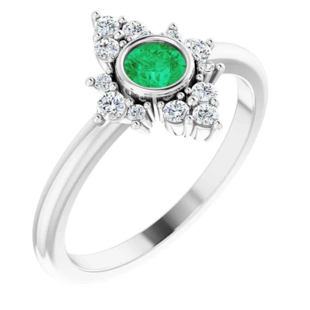 Women's 14k white gold starburst engagement ring with emerald stone