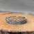 Women's infinity inspired stackable wedding ring with aquamarine