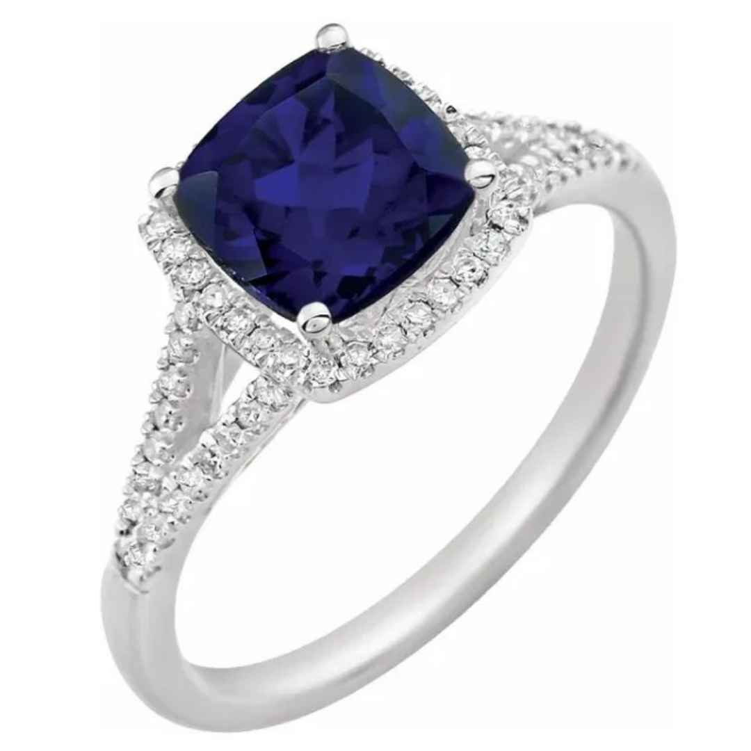 Women's blue sapphire halo engagement ring 