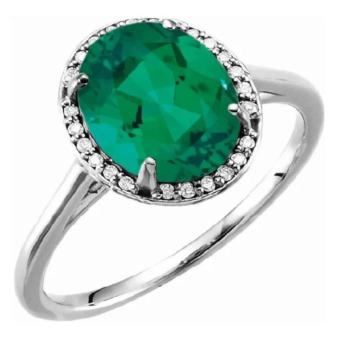 Women's 14K white gold emerald engagement ring with 10 x 8 mm stone